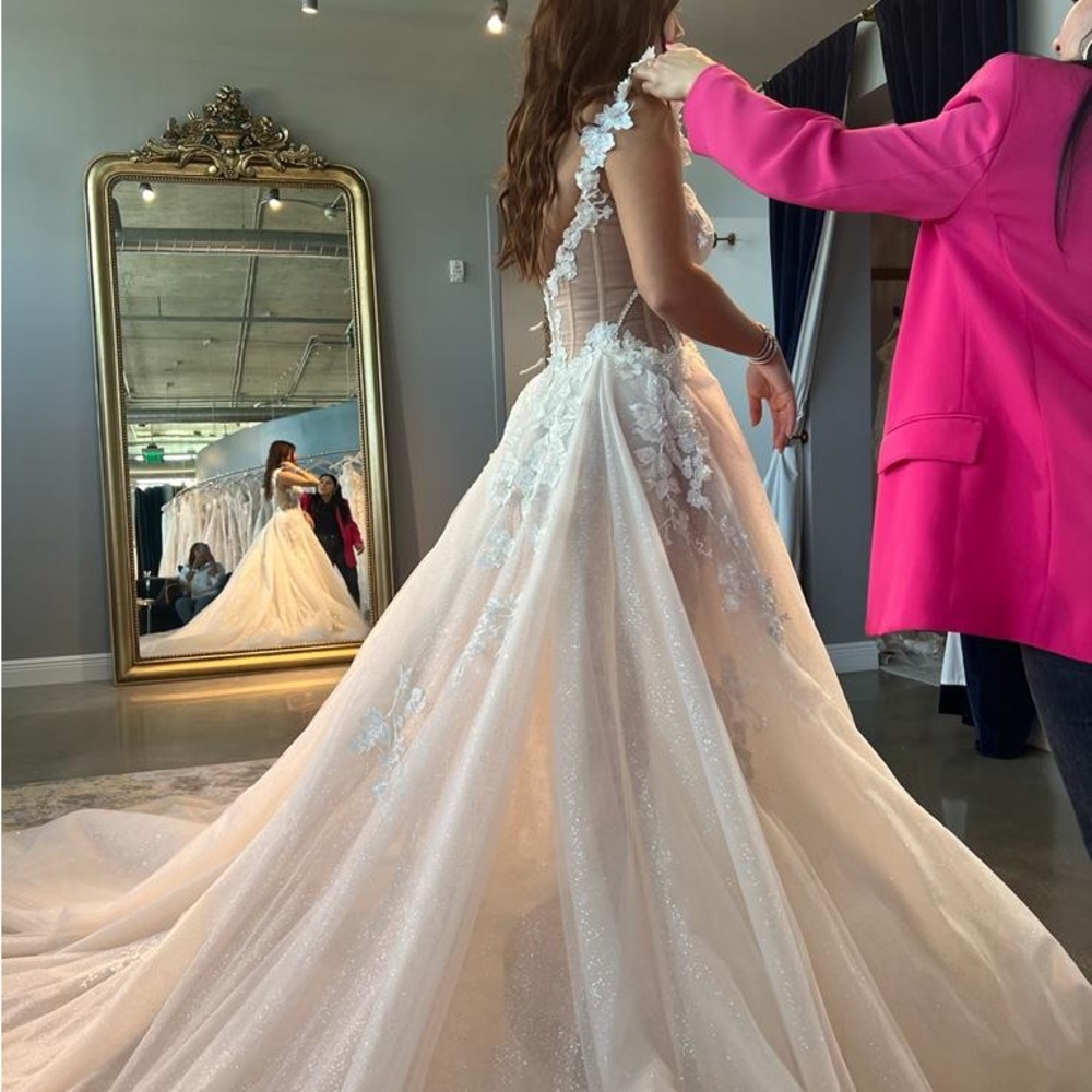 Elegant White Wedding Gown with Lace Details